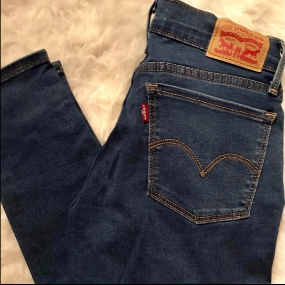 Levi's 710 blue mid rise skinny jeans 27